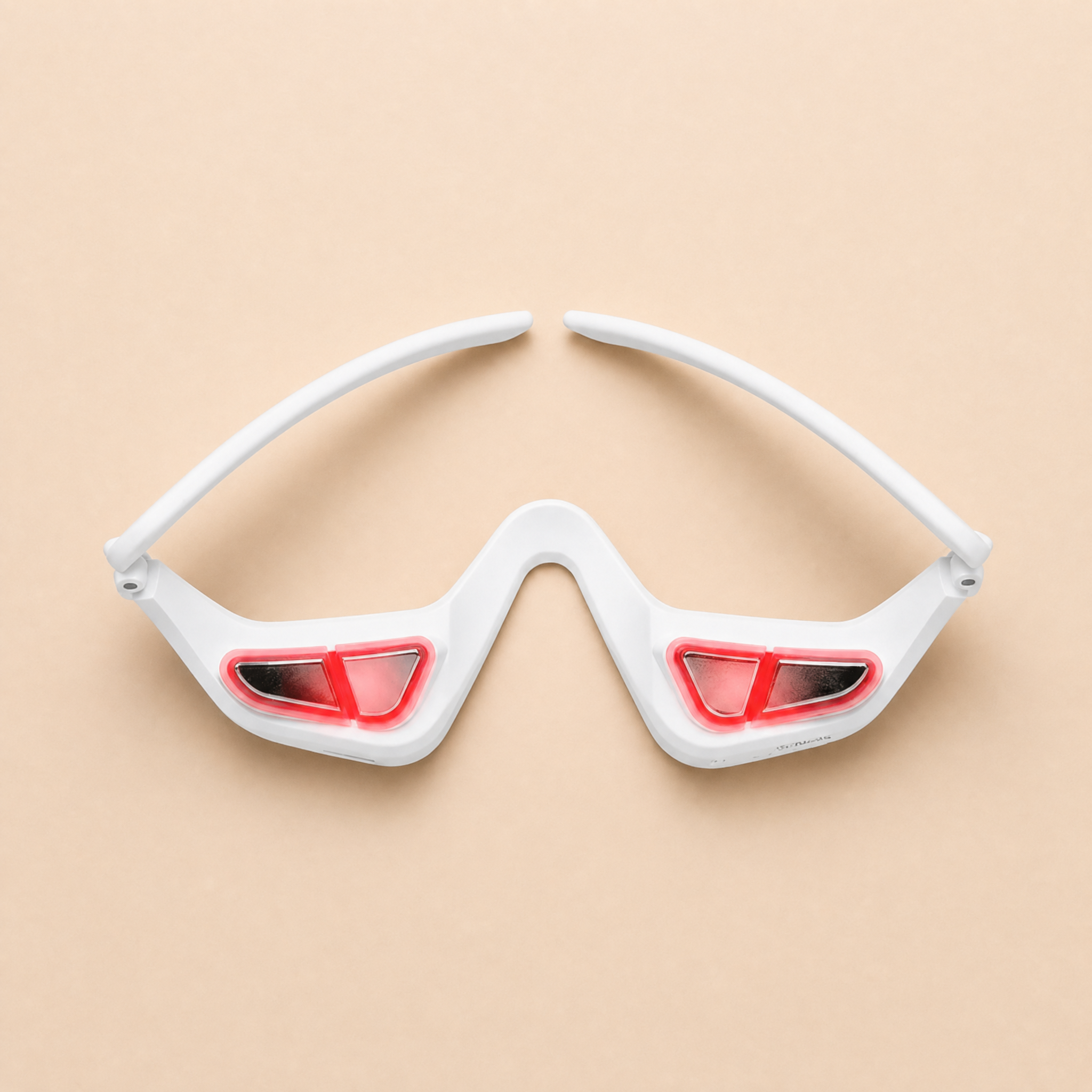 EYESENTIAL smart eye massager glasses - studio product shot on warm beige