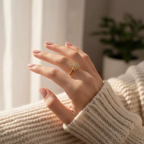 CalmSpin anxiety ring worn on hand