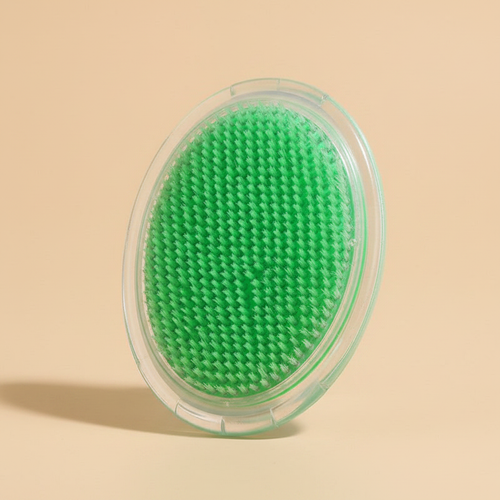 LYMPHA-SCULPT face and scalp brush - studio shot on warm beige
