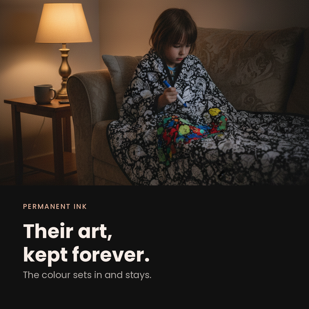 Permanent ink: their art, kept forever — a child wrapped in the blanket colouring in the evening